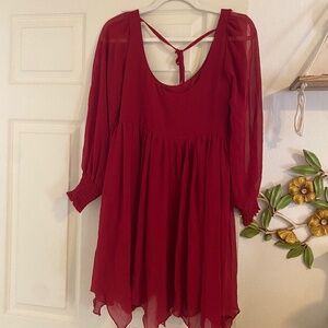 Women's medium size red dress with sheer sleeves